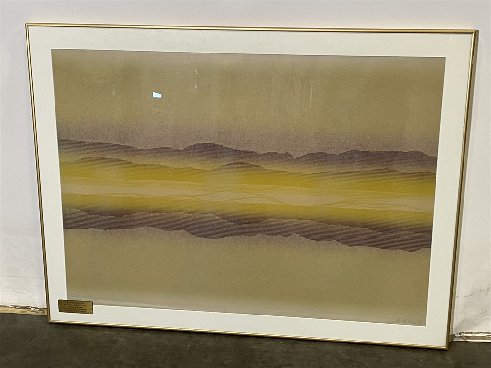 Print is yellow with grayish-purple that appears like mountains in the distance